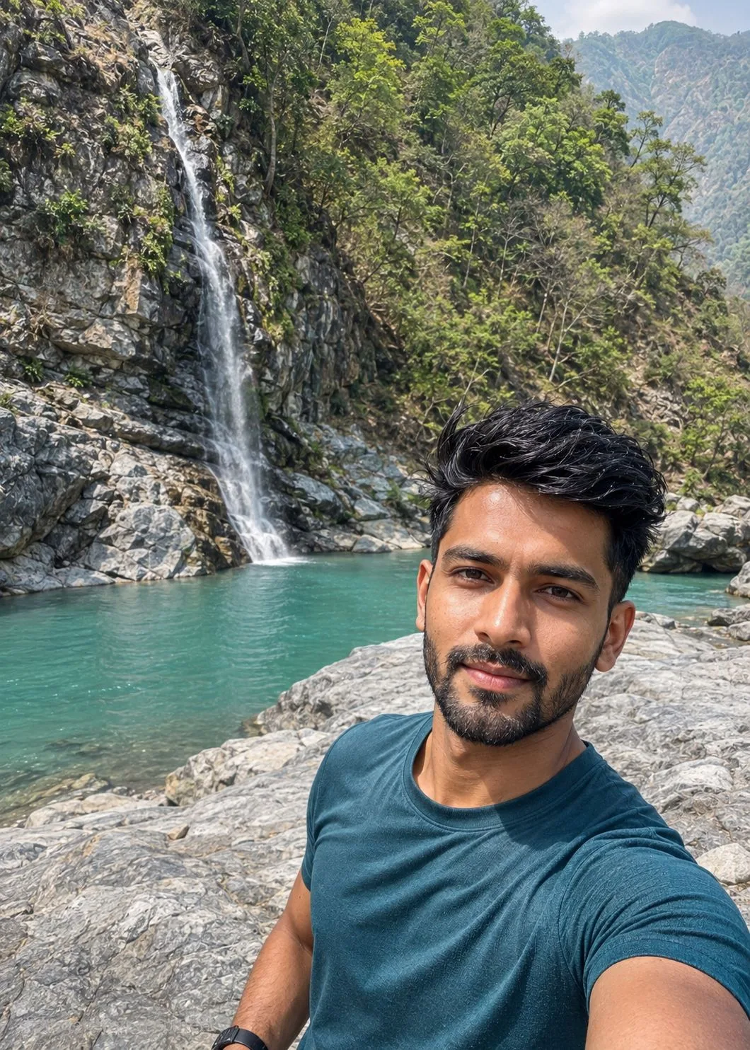 Indian Man Taking a Selfie at Mountain Waterfall